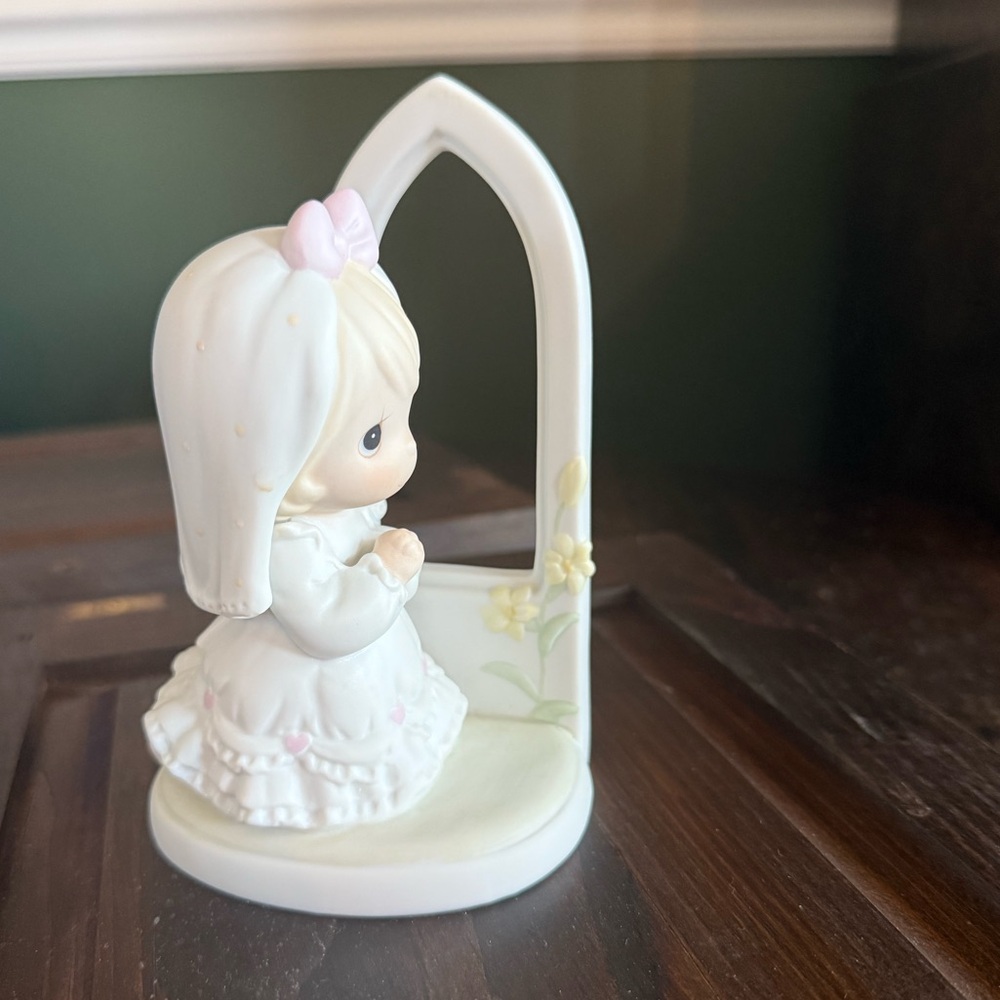 Adorable Figurine with Bow and Flowers